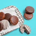 Load image into Gallery viewer, Signature Chocolatey Covered Sandwich Cookies
